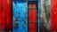 Placeholder: Painting depicting a weathered metal wall with a prominent, half-open red door through which a person is peering. The wall is blue, stained with rust and peeling paint, giving it an industrial, textured appearance. Rusty metal boxes are attached to the wall, along with vertical and horizontal pipes.