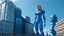 Placeholder: A full-body photograph of a young, slender, blond woman in a blue one-piece suit, standing in front of futuristic buildings. A robot standing beside her. Bright, sunny day.