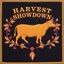 Placeholder: an autumn colored textured cloth embroidered ornamental leaves and cattle, pointed bottom, on dark background, embroidered text across top "HARVEST SHOWDOWN" block text, Canadian western cowboy style