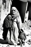 Placeholder: Palestinian old woman , Carrying a small girl ,at winter , Destroyed Buildings , with a Explosions, at night