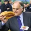 Placeholder: President Lacalle Pou stealing a choripan