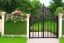 Placeholder: intricate ornate gate, garden, path, flowers