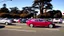 Placeholder: A Tesla's 'Model S Plaid' is racing at top speed, across the 'Golden Gate Park', in San Francisco. CINEMATIC. WIDE ANGLE LENS. PHOTO REAL.