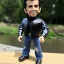 Placeholder: figure smile Fonzie arthur fonzarelli young greaser jacket winkler toy doll face boot (plastic black hair) full body in package (two thumbs-up) 2022