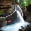 Placeholder: Cybeepunk picture, fantasy, cave water falls, highest peak island,