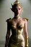 Placeholder: Scarlett Johansson, as an elf queen wearing a gold lame dress with spaghetti straps, standing against a dark background with muted stage lighting