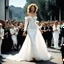 Placeholder: [colour photo by Helmut Newton] she stops with no inhibitions on the runaway in wedding dress on heel for agent provocateur, the crowd is clapping