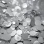 Placeholder: a photograph of round silver confetti