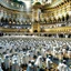 Placeholder: The scene in Mecca: People wearing white Ihram clothes, men without head coverings, women with veils, circumambulating around the Kaaba, and above them are transparent white spirits of children, men, and women with wings revolving around the Kaaba.