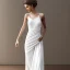 Placeholder: Greek white marble stature, full body in draped gown, full of details, realistic, beautiful woman, high definition, 8k