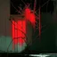 Placeholder: Minimal abstract oil painting of a neon plant in concrete warehouse brutalist architecture and hanging wires illuminated at night. With triadic red colours. In the style of Justin Mortimer and Phil Hale, Ashley Wood