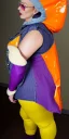 Placeholder: Bright-color-haired woman.thick thighs,thick calves,flat belly,curvy fell. big head. Mantle is sewed of upcycled Denim and sewed together of camouflage pieces. Pieces' color are orange, cream and purple. Cream latex gaiters.It is with big bright purple felt tippet and cream-colored-hood. mantle has a hood. Big AKG-style headphones (gold rings!) is merged with small felt cap with small visor. Style: Haute Couture in 1920's, N.Y.C fashion in 1996, inspired by street art.