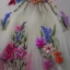 Placeholder: delicate embroidery and beadwork of flowers on tulle, couture, beautiful composition, aesthetic layout, wildflowers, watercolor