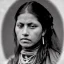 Placeholder: sepia close-up of female mexican outlaw wearing a gunbelt on waist and rows of bullets across chest, long black wavy hair, beautiful face, 1800s, 8k, high-quality, ultra-fine detail,