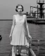 Placeholder: sepia young woman wearing white dress standing on wharf in shipyard, 1930s, 8k resolution, high-quality, fine-detail, intricate, digital art, detailed matte, volumetric lighting, dynamic lighting, illustration, 3D octane render, brian froud, howard lyon, selina french, anna dittmann, annie stokes, lisa parker, greg rutowski,