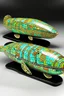 Placeholder: Mint colored airships shaped like peppermints painted by Gustav Klimt