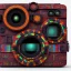 Placeholder: futuristic pinhole camera in Kente, rusted clocks lens, cinematic, scaffolding, african pattern symbols, engraved, cinema 4d, 3d render, corona renderer, 8k quality