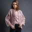 Placeholder: Model with crochet cardigan pink