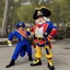 Placeholder: an old Captain Crunch standing in a Captain Morgan pose