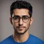 Placeholder: 26 years old Egyptian male wearing blue shirt, with glasses, short hair, no beard