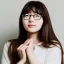 Placeholder: Portrait of a beautiful Korean girl with brown hair and round glasses wearing white headphones with her hand under her chin