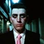 Placeholder: very grainy discolored 2000s photo, closeup portrait, dark night alley with no lights, grunge, extremely gaunt male with chalk-white skin wearing a good soviet era suit with a pink tie, calm, imposing, ridiculous hairdo, crazy look in the eyes, malkavian