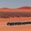 Placeholder: A caravan of robots walking in line in Sahara by arik roper