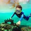 Placeholder: a boy diving in the ocean with diving gear and finds ancient treasure chest, photo realistic, bright, happy