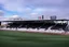 Placeholder: White neon light spells out work "ACF", stadium in Alentejo from Portugal, Shot on Canon EOS R5, 50mm lens, depth of field, shutter speed 1/ 1000, f/ 2. 8, white balance, 6000k. High resolution, realistic details, HDR efects, film grain, 4K. –ar 16: 10 –