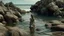 Placeholder: Woman with organic design that blends into the rocky surroundings at the water's edge