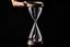 Placeholder: A picture of a person holding a hourglass symbolizes the importance of time management and making the most of it.