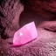 Placeholder: single pink crystal, in a foggy cave