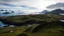 Placeholder: South Georgia island, penguin colony, ocean, mountains, sky, beautiful composition, award-winning photograph, astonishing realism, 28mm lens, adjust perspective