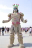 Placeholder: 10,000 nerds worshipping giant lord of nerd at burning man festival in the style of hiroku ogai