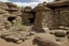 Placeholder: A brown rocky ruins designed in native American petroglyphs