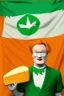 Placeholder: Conan O'Brien with bright orange hair holding orange cheese. "Esperanto flag in background". Green-flag-with-white-star. Green flag in background