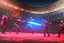 Placeholder: cyborgs fighting against each other in roman colosseum, perfect, sharp,red blossoms, laserweapongs,8k quality, cyberpunk art, neon lights, rustical, old technology, pink shining, showkampf, antik, römisches empire, wide angle, high rise, sharp focus, hyper detailed, digital painting, elegant, centered, detailed, neon signs, volumetric lightning, brutalist architecture, 8k, flying hover cars