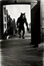 Placeholder: Photograph of a shadowy werewolf prowling a Hollywood movie lot. Grainy, b/w, date approximately 1922.