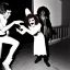 Placeholder: Photo of 1980s party with a vampire scaring a cat