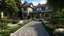 Placeholder: generate an image of a house with beautiful driveway and garden in it