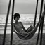 Placeholder: mujer sentada en una hamaca de madera en la playa, fotografía real, fotografía realizada con un cámara Fuji y objetivo de 35mm, fotografía en blanco y negro, tono años 60