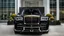 Placeholder: A (((Super Black Rolls-Royce Cullinan))) featuring a luxurious interior, advanced technologies, and a sleek body kit designed by MANSORY, exuding an air of sophistication and power