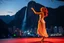 Placeholder: A modern city at the foot of the mountain. The entrance valley with a waterfall from a high rock. A beautiful lady dancer showing her performance in a poen stage in a top and midi skirt. at night ,dynamic color turnning lights