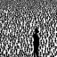 Placeholder: full colour man, stands out from black and white crowd,