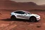 Placeholder: A Tesla 'Model Y' is drifting at high speeds, at the Cydonia region on Mars. (CINEMATIC, WIDE ANGLE LENS, PHOTO REAL)