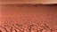 Placeholder: A Tesla's 'Model S Plaid' is parked, in the 'Cydonia' region, on planet Mars. CINEMATIC. WIDE ANGLE LENS.