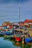 Placeholder: gothic, medieval, fishing town, rocks, long piers, fishing boats, shops, blue sky