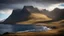 Placeholder: Mountainous landscape on Kerguelen, dramatic sunlight, chiaroscuro, beautiful composition, award-winning photograph