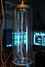 Placeholder: Photo of real longs inside A glass cylinder connected with wires to main computer