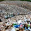 Placeholder: A photo of a landfill or waste disposal site to represent the issue of non-recyclable filters.